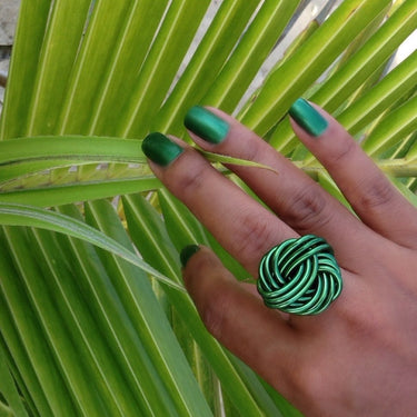 Dark green anodized aluminum wire wrap ring.
