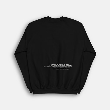 black crewneck with paragraph on the back