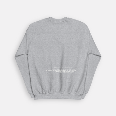 heather gray crewneck with paragraph on sweatshirt