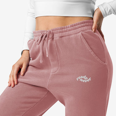 model wearing pale pink READY NEVER CALI WASH JOGGERS