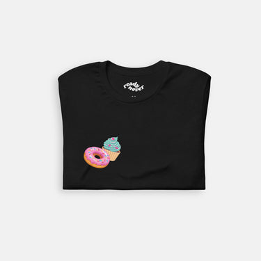 folded view of donut and cupcake graphic on black cotton t-shirt 