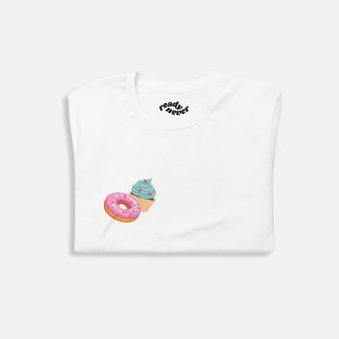 folded view of pink icing donut and blue icing cupcake graphic cotton t-shirt 