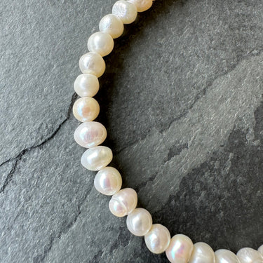 close up of FRESHWATER PEARL BEAD BRACELET handcrafted for men