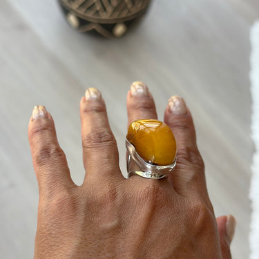 curve African amber ring