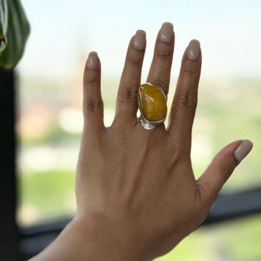 curve African amber ring