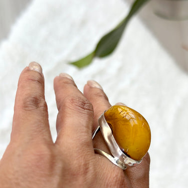 curve African amber ring