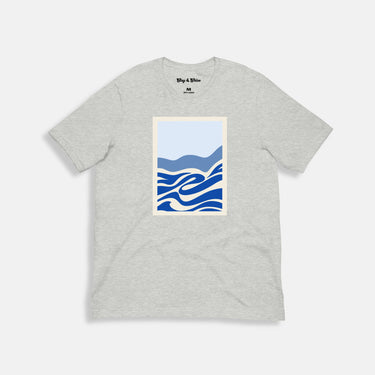 gray shirt with abstract ocean waves on the front