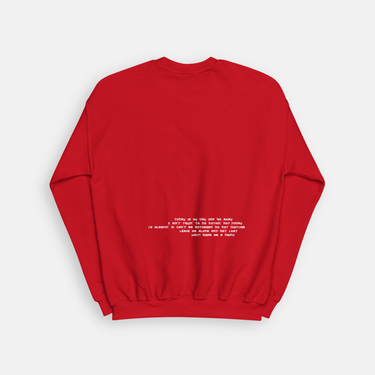 red crewneck with paragraph on sweatshirt