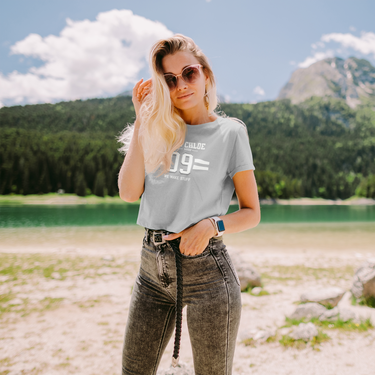 model wearing gray gray clay and Chloe crop top logo we make stuff