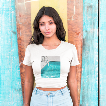 model wearing white clay and Chloe crop top with box graphic 