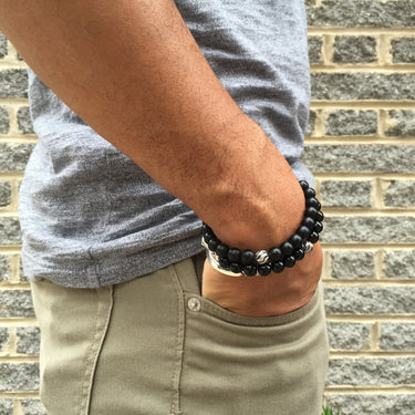 handmade black bead bracelet on model 