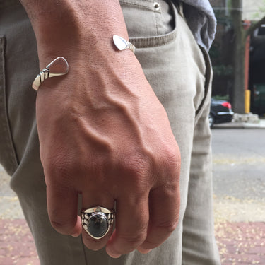 side view of model wearing pyrite ring handcrafted for men 
