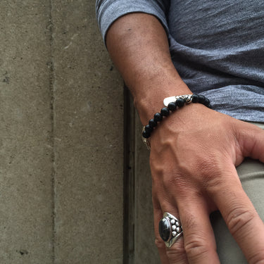 front view of model wearing pyrite and sterling silver ring for men