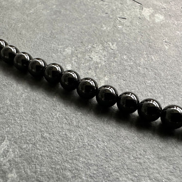 close up of BEAD NECKLACE WITH BLACK ONYX