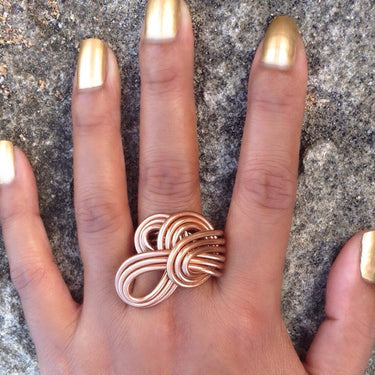 Light brown color anodized aluminum wire wrap ring.