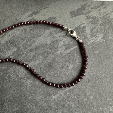 necklace for men with tiny garnet beads