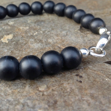 close up view of MATTE ONYX BEADs and sterling silver lobster clasp BRACELET