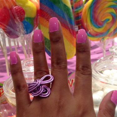 Pink color anodized aluminum wire wrap ring. 
