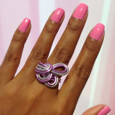 Pink and silver color anodized aluminum wire wrap ring.