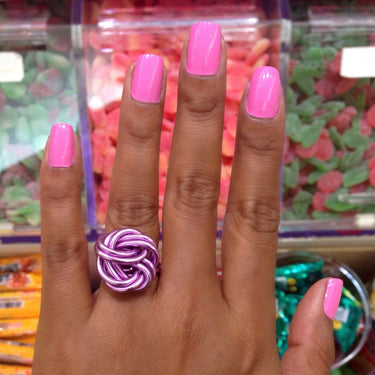 Pink color anodized aluminum wire wrap ring. 
