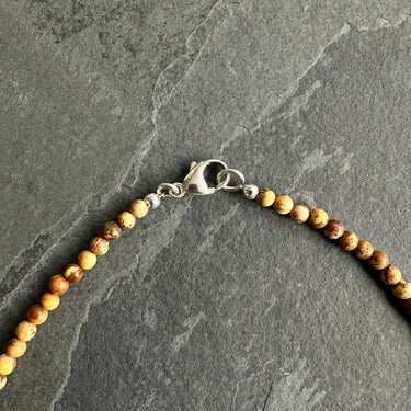 close up sterling silver lobster clasp on BEAD NECKLACE WITH PICTURE JASPER