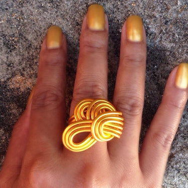 Gold anodized aluminum wire wrap ring.