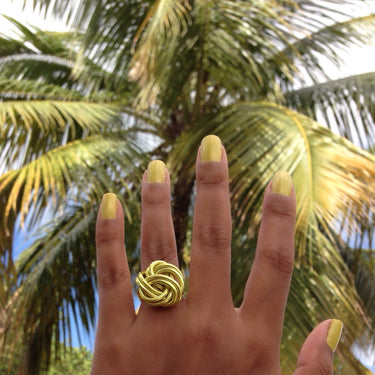 Light green color anodized aluminum wire wrap ring. 
