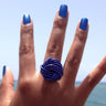 Dark blue color anodized aluminum wire wrap ring.