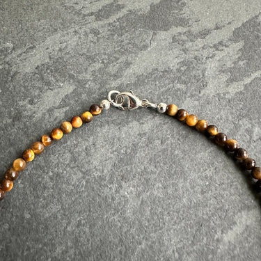 close up view of sterling silver clasp on BEAD NECKLACE WITH TIGER’S EYE