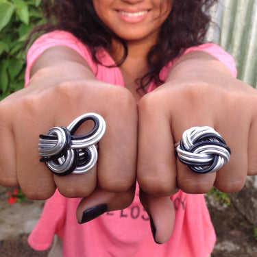 Silver and black color anodized aluminum wire wrap ring. 
