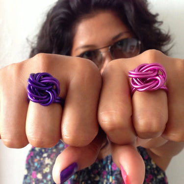 Fuchsia color anodized aluminum wire wrap ring.
