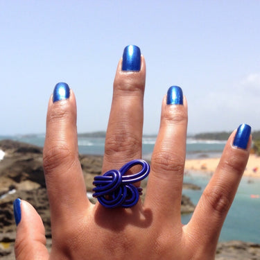 Dark blue color anodized aluminum wire wrap ring.