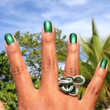 Dark green and silver color anodized aluminum wire wrap ring. 
