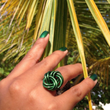 Dark green color anodized aluminum wire wrap ring.
