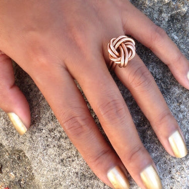 Light brown color anodized aluminum wire wrap ring.
