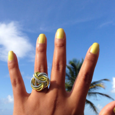 Light green and light blue color anodized aluminum wire wrap ring. 
